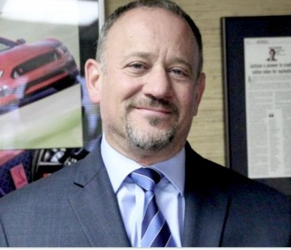 Headshot of Leo Sfikas